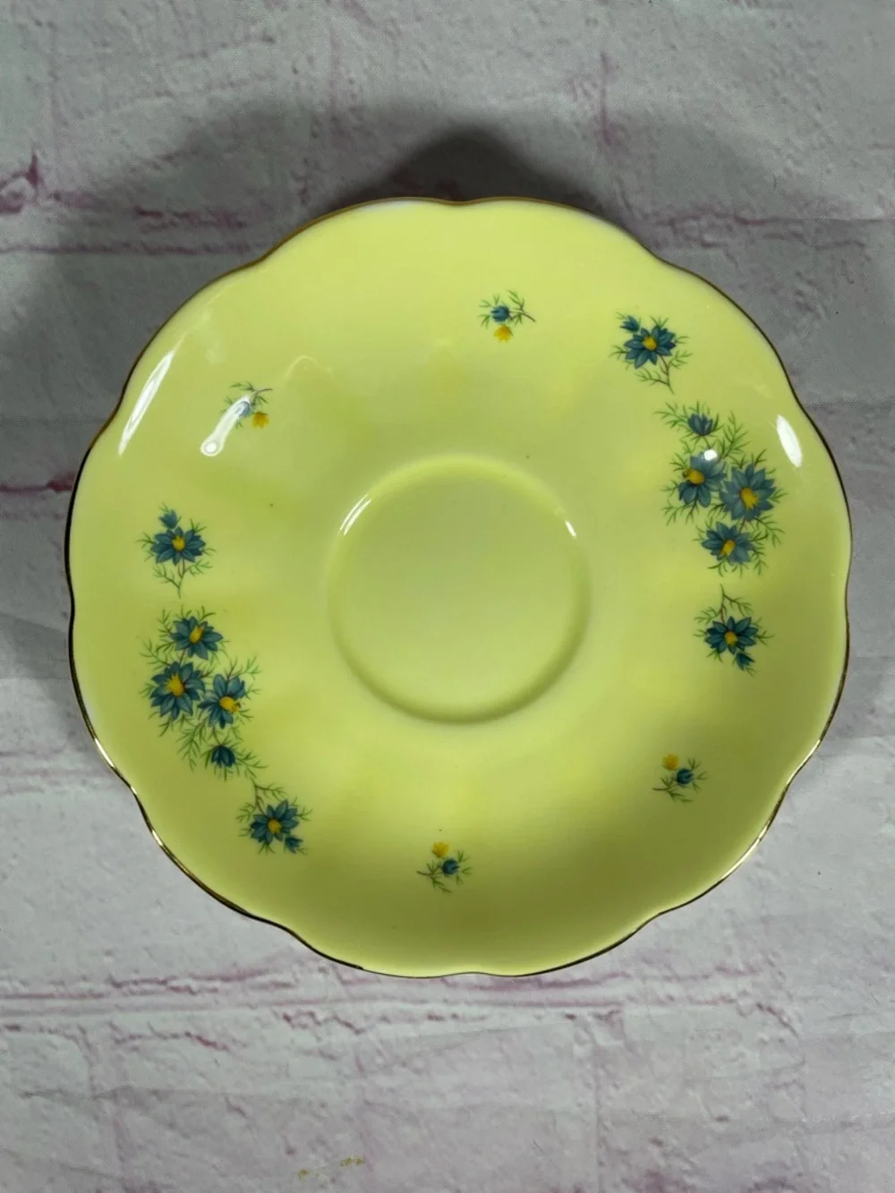 Vintage Yellow and Blue Floral Gold Trim Bone China Footed Teacup and Saucer Set